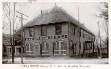 According to Monroe Town Historian James Nelson, the Firemen’s Opera House was purchased by Mombasha Fire Co. in 1900 to house its firefighting equipment. Upstairs was the meeting rooms, which would be used for dances, lectures and later movies. The basement held a jail cell and was a village lockup. It did not get good marks from the state jail inspector. They would later build a separate building in the rear of the fire house for just a jail. The building dates back the mid 1800’s and served as Tin Shop and hardware store previously. The fire company moved to Route 17M in 1969 and the building would eventually become the Flynn Funeral Home.