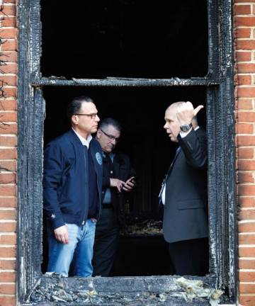 Pennsylvania Gov. Josh Shapiro speaks the Pennsylvania State Police investigators Sunday about the act of arson that took place at the Governor's Residence earlier that morning.