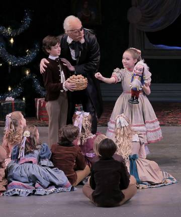 Credit Photo: Paul Kolnik Shown is the party scene from George Balanchine's The Nutcracker from last year. Pierson will be a guest in the party scene during this year's performances. From left to right: Robert La Fosse as Herr Drosselmeier, Colby Clark as his Nephew and Fiona Brennan as Marie