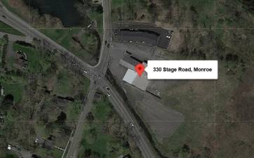 The existing building may eventually contain an auto shop, a furniture store, and other retail.