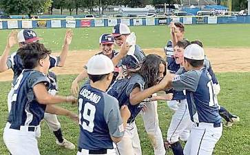 Members of the Monroe-Woodbury Little League 11U team celebrate their State Championship.