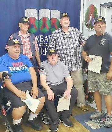 Positioned in front are veterans Phil Morello and Ken Smith and standing behind that are fellow veterans Donald Blair, Raymond “Doc” Cooper and Steve LaRosa. Photos by Linda Mastrogiacomo.