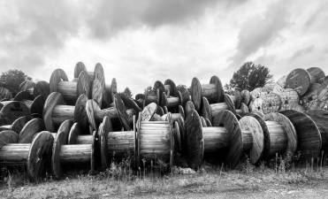 Terry Reilly, Senior Account Executive for Straus News and The Warwick Advertiser, shared this photo of used wooden cable and wire reels stacked on top of each other on a recent cloudy day at Reelcology on Transport Lane in Pine Island. Reelcology is one of the leading recycling manufacturers of wooden and metal cable reels on the East Coast.