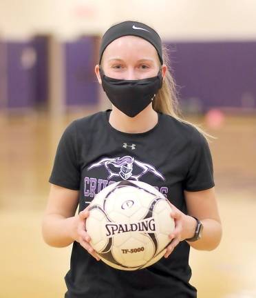 Grace Wanderling’s smiling eyes says it all as the Crusaders get ready for the season.
