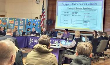 School officials offered a slide-slow update on the Grade 3-8 ELA and Math student assessments at the Feb. 8 Monroe-Woodbury School Board meeting. Photo by MJ Hanley-Goff.