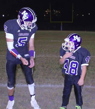 Quarterback Ryan O&#xfe;&#xc4;&#xf4;Malley and halfback Anthony Scancarello get ready for the big play.