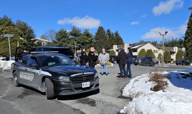 Access to the apartment complex was restricted as officers investigated the scene.