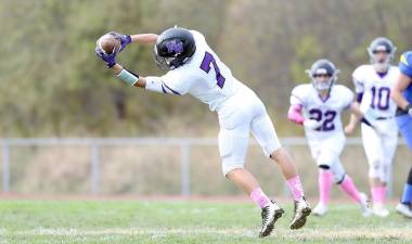 Michael Zrelak makes a diving catch early in the game.