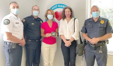 Pictured from left to right are: Middletown Police Chief John Ewanciw, Chief Dominick Blasko of the Crawford Police Department, Annette Kahrs, Senator Jen Metzger,and Sergeant Allen Faust of the Goshen Police Department at Kahrs’ Commendation celebration. Provided photo.