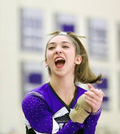 Lizzy Pisello gets the crowd going as the Crusaders start their routine.