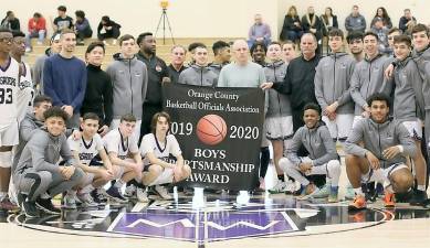 Before the game the Crusader Varsity and JV Teams were awarded the Orange County Basketball Officials Association Boys Sportsmanship Award.