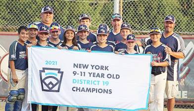 MWLL 11U District Champions are, from left to right, beginning in the back row: Coach Bauer, Mike Zymberi, Coach Bond and Coach Monda; middle row, from left: Cole Engel, Connor McHale, Brian Sorce, Evan Mejia, Joey Bauer and Kyle Lascano; and in front: Brandon Schwarz, Aaron Drucker, Michael Monda, Drew Lugo and Jake Bond.