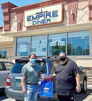 Rabbi Roger Lerner of Monroe Temple of Liberal Judaism and Empire Diner owner David Wenger have joined forces to replicate a Pennsylvania program that has been successful in feeding hundreds of children per week over the past decade. (Photo source: dinners4kidsoc.org)