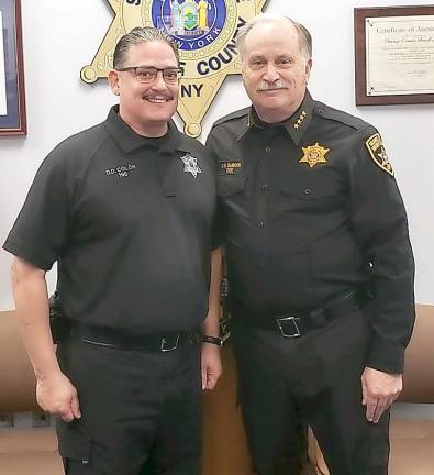 Officer David Colon (left) with Sheriff Carl DuBois