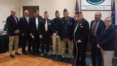 American Legion Post 488 in Monroe and American Legion Post 1573 in Harriman were the recipients of the proceeds from the recent Monroe Food Truck Festival. Presenting the proceeds at a recent Monroe Town Hall meeting were town officials Tony Cardone, Sal Scancarello, Rick Colon and Mary Bingham to American Legion Post 488 representatives Marty Currid, Kurt Haug and Paul Damond; and American Legion Post 1573 representatives Paul and Jerry Oser. Provided photo.