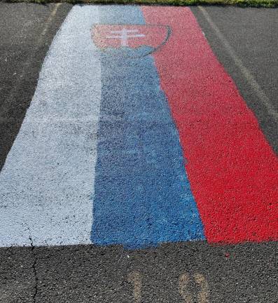 Tuxedo. George F. Baker seniors in Tuxedo paint parking spots