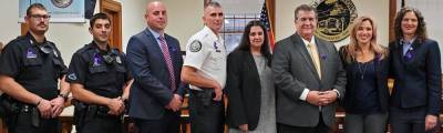 NYS Senator Jen Metzger (far right) with Kellyann Kostyal-Larrier of Safe Homes of Orange County (second from right), Mayor Joe DeStefano (third from right), along with representatives of Legal Services of the Hudson Valley and local law enforcement.
