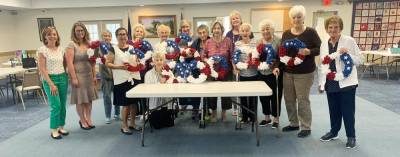 Monroe Free Library Head of Reference and Adult Programming and Executive Director Amanda Primiano facilitated a patriotic wreath craft at the Monroe Senior Center in June. Provided photo.