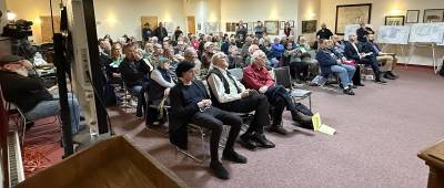 About 100 people attend the Warwick Town Planning Board meeting April 16 for a public hearing about a rabbinical studies project in Sterling Forest. (Photo by Peter Lyons Hall)