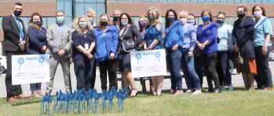 Orange County Child Advocacy Center staff in front of the new office on 30 Matthews St. in Goshen. The center brings child protective services, law enforcement, medical providers, advocacy and therapeutic resources together when allegations of child abuse or maltreatment are made to make the investigation process less traumatic for children. Photo provided by Orange County.