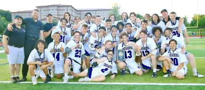 The Section 9 Champion Crusaders celebrate their victory over Kingston. Photos by William Dimmit.