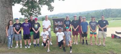 Pictured from left to right at the Earl Reservoir in Highland Mills are Councilwoman Jackie Hernandez, Mason Diltz, Joe Han, Councilman Tom Burke, Josh Gorlin, Parks Committee member Brandon Calore, Braedan Burke, Noah Brito, Liam Hayes, Lucas Beers, Anthony Aversa, Martha Lopez, Jaxon Chiavaro, John Gazzola and Parks Committee member Philip Sabatelli. Photo provided by Martha Lopez.