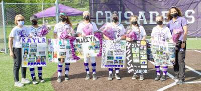 Senior Day Crusaders: Pictured from left to right are: Assistant Coach Elaine Schellbergh, Kayla Felix, Natalie Welsh, Makiya Himes, Marissa Napolitano, Hallie Heady, Julie Wolfenhaut and Head Coach Penny Roberts. Photos by William Dimmit.