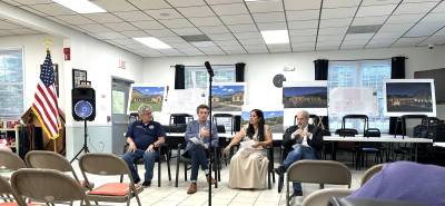 Woodbury Town Supervisor Jacqueline Hernandez (center) outlined the town’s next steps regarding transportation services at the June 29 joint Town and Village Hall meeting.
