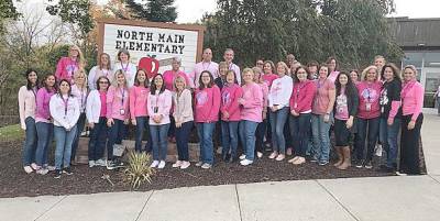 This photo is a representation of North Main Elementary and its staff's support for cancer awareness. North Main Elementary teacher and a breast cancer survivor Michelle PereiraI led the district's fund-raising efforts for the American Cancer Society's Making Strides Against Breast Cancer Walk held Oct. 20 at Woodbury Common Premium Outlets. Our entire staff has always been very generous, not only in their monetary contributions, but in offering their never-ending support and encouragement to those affected by this disease, Pereira wrote in submitting the photo. This year proved no different.