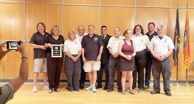 Woodbury Community Ambulance members accepting the award at the Orange County Emergency Services Center: From left to right: Pat Conques, Debbie Vobroucek, Sue Arent, Greg Hatzis, David Sutz, Dan Willis, Lynn Haviland, Justine Sutz, Amy Arensberg, Dan Pezzola and Ben Conques. Provided photos.