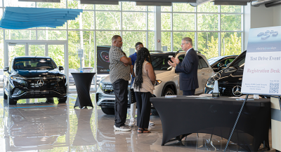 Guests learn about Mercedes-Benz new E-series (electric series) and the benefits including two years of free charging and service package.