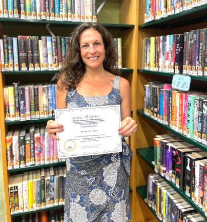 Elizabeth Walraven earned the ALA 2026 PR Xchange Award for her promotional work on Monroe Free Library’s 1970s Disco Party.