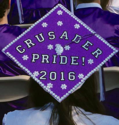 Crusader Pride one of the many beautifully decorated graduation caps.