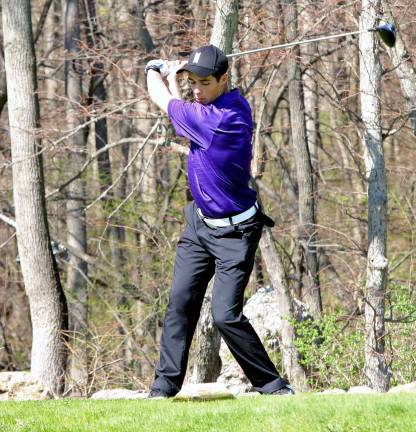 Ryan Hunter tee's off on the third hole; he turned in a round of 40.
