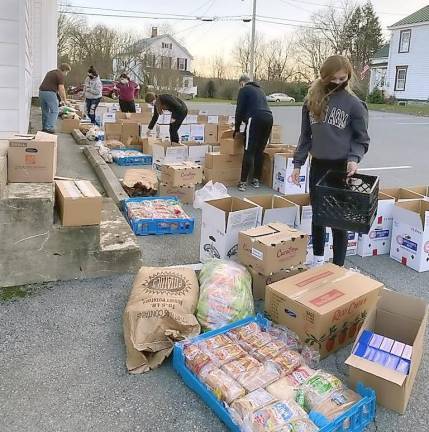 Sue Banville, one of the food pantry’s organizers, said the food pantry planned to make 60 boxes, but based on additional requests, ended up preparing and distributing 75 boxes.