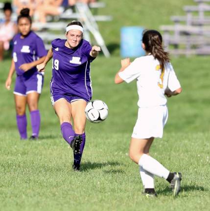 Nicole Conway (#19) strong play has helped keep the Crusaders opponents off the board so far this year.