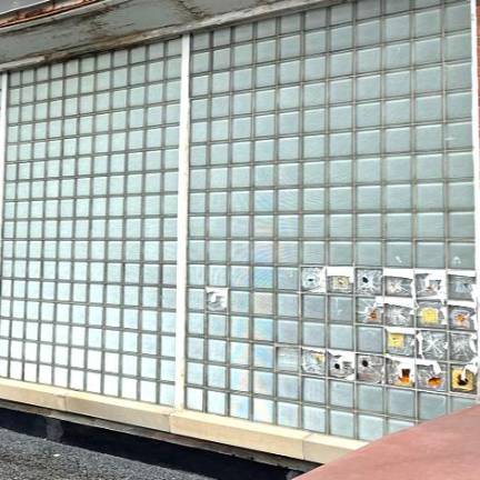 Broken glass wall blocks in the Central Valley Elementary School gymnasium.