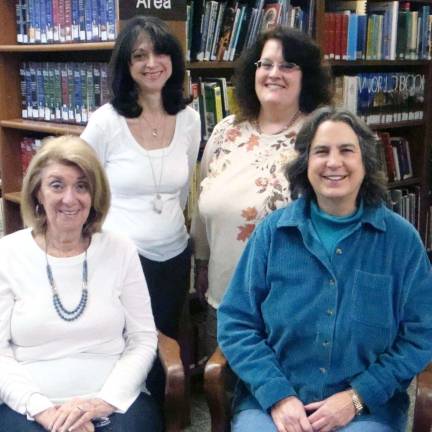 The officers of the Friends of the Monroe Free Library are, in the back row: Mary Rodriguez, left, vice president; and Diane LeViseur, president. Front row: Sheila Stein, left, secretary; and Andrea Pfleger, treasurer.