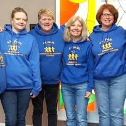 Pictured (L to R): Heather TInger, Ramona Adams, Susan Falasca and Karen Reina. Adams is retiring as director after 26 years.