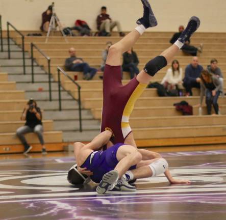 Marco Vespa (126 lbs.) stands his opponent on his head before recording the fastest pin of the match in 23 seconds.