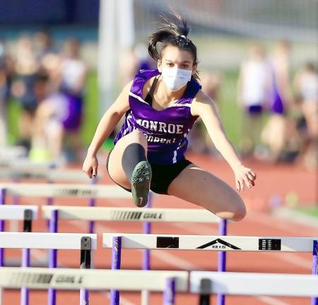 Yasmine Peralta captured first in the 100 and 400 meter hurdles for the Crusaders.