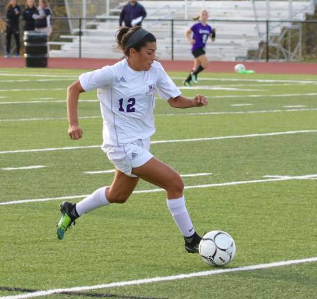 Angelica Sanchez (#12) flies down the sidline before scoring the final goal of the game.
