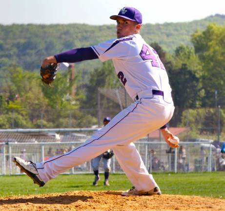 Photo by William Dimmit Jared Bulson held the Warwick Valley Wildcats in check while picking up his complete game 3-2 victory.