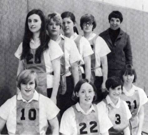 In this 1971 women's basketball team photo, Sue Deer is wearing number 10.