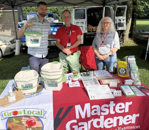 Pictured from left to right at Saturday’s Lakeside Farmers Market in Greenwood Lake are: Ermin Siljkovic, Orange County Recycling Coordinator and Jim Hall and Kirsten McCormick, both Master Gardeners with Cornell University Cooperative Agricultural Extension. Photo by Peter Lyons Hall.