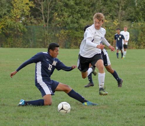 Petro Klisch (#1) flies past his defender. Klisch scored one goal and assisted on the other in Monroe-Woodbury's 2-0 victory on Monday against Newburgh Free Academy.