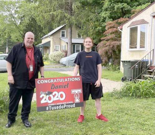 Tuxedo School Superintendent Tim Bohlke and senior Daniel Biba.