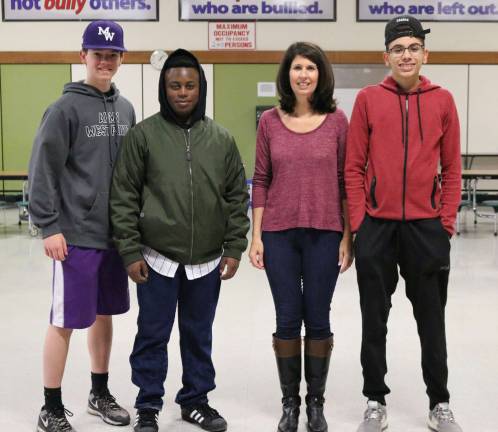 From left to right are Dylan Beers, Narius Caesar, Smith Clove Assistant Principal Christine Ricker and Pablo Quinones.