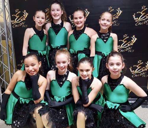 The Pre-Company team danced to &quot;One Short Day.&quot; Back row: Brina Muller, left, Kaitlyn Larkin, Ava Auty and Lindsay Hairston. Front row: Kariana Diaz, left, Madelyn Rita, Chloe Bevacqua and Tovah Buchman.