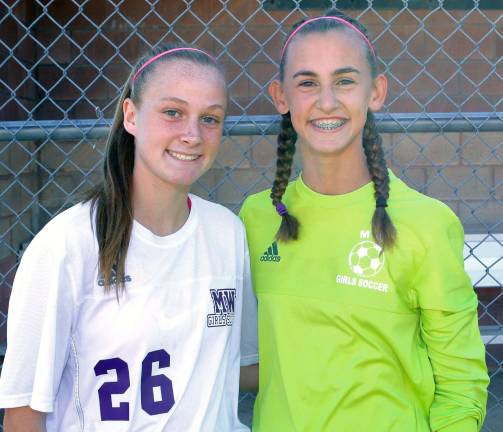 Crusader Freshmen: Pictured from left to right are: Liz Allen and Angella Fini.